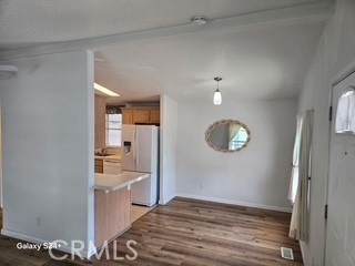 195 Tierra Rejada Road, Unit 29 Simi Valley, CA 93065 - Photo 20 of 33 a view of a room with wooden floor and a bathroom