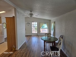 195 Tierra Rejada Road, Unit 29 Simi Valley, CA 93065 - Photo 21 of 33 a view of a dining room with furniture window and wooden floor