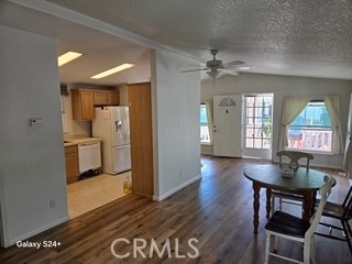 195 Tierra Rejada Road, Unit 29 Simi Valley, CA 93065 - Photo 23 of 33 a view of a dining room with furniture and wooden floor