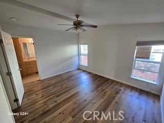 195 Tierra Rejada Road, Unit 29 Simi Valley, CA 93065 - Photo 24 of 33 wooden floor in an empty room with a window