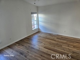 195 Tierra Rejada Road, Unit 29 Simi Valley, CA 93065 - Photo 26 of 33 wooden floor in an empty room