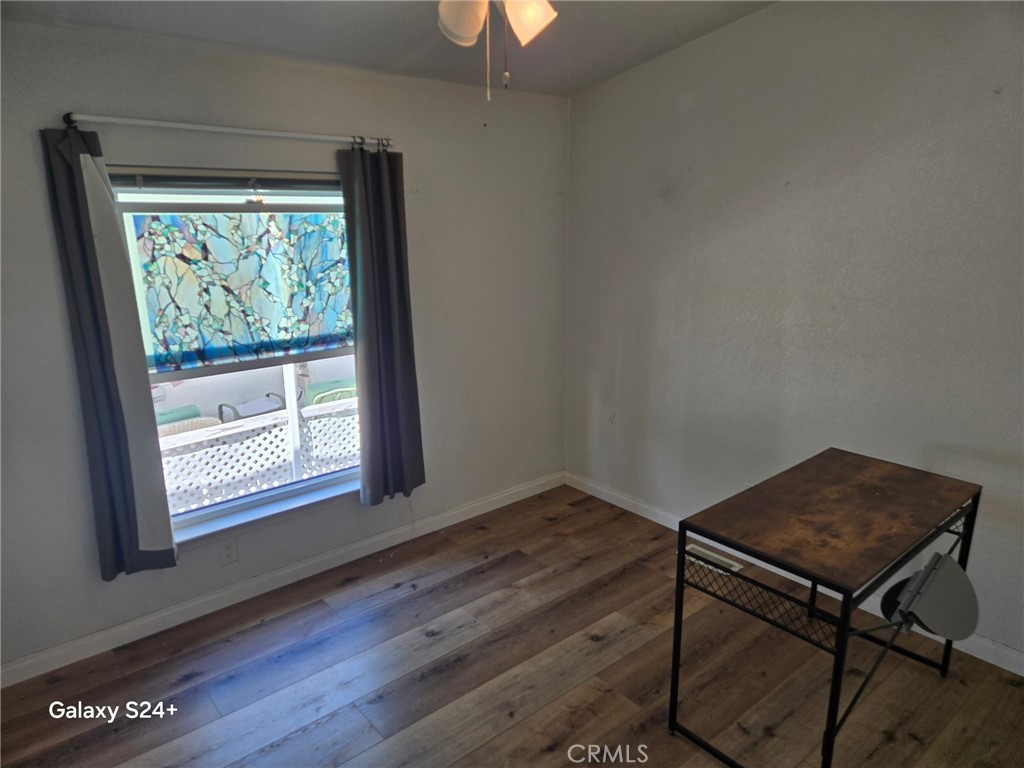 195 Tierra Rejada Road, Unit 29 Simi Valley, CA 93065 - Photo 28 of 33 wooden floor in an empty room with a window