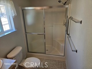 195 Tierra Rejada Road, Unit 29 Simi Valley, CA 93065 - Photo 30 of 33 a bathroom with a shower and toilet