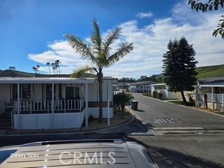 195 Tierra Rejada Road, Unit 29 Simi Valley, CA 93065 - Photo 3 of 33 a view of a house with a yard