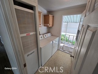 195 Tierra Rejada Road, Unit 29 Simi Valley, CA 93065 - Photo 33 of 33 a room with window washer and dryer