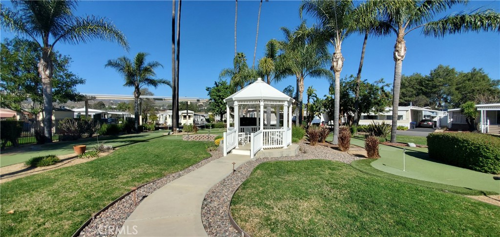 195 Tierra Rejada Road, Unit 29 Simi Valley, CA 93065 - Photo 6 of 33 a swimming pool with outdoor seating and yard