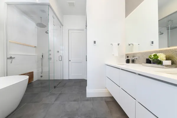 a bathroom with a bathtub and a sink