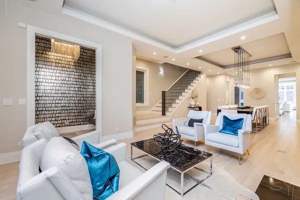 a living room with furniture and a table
