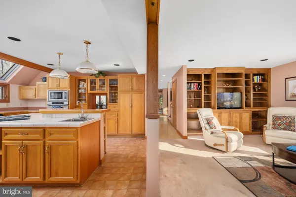 a dining room with furniture and entryway