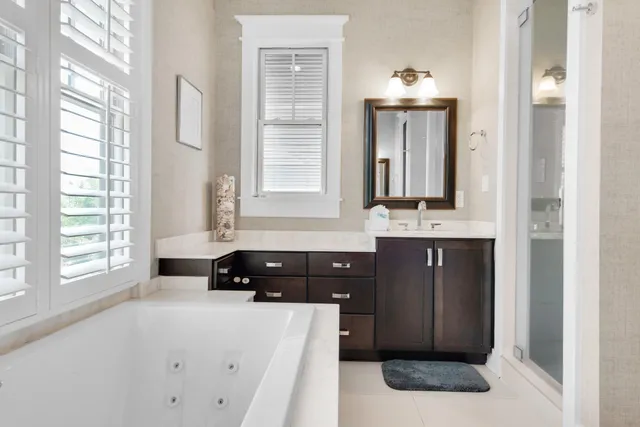 a bathroom with a sink a vanity and a mirror
