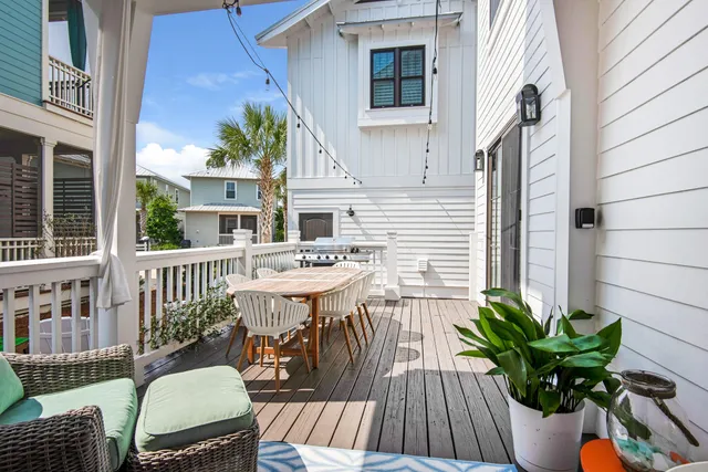 a view of a chair and table in the balcony