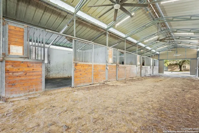 a view of a room with wooden walls