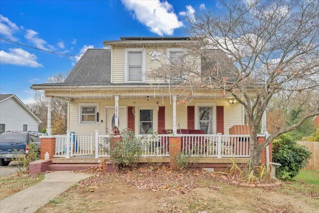 front view of a house with a small yard