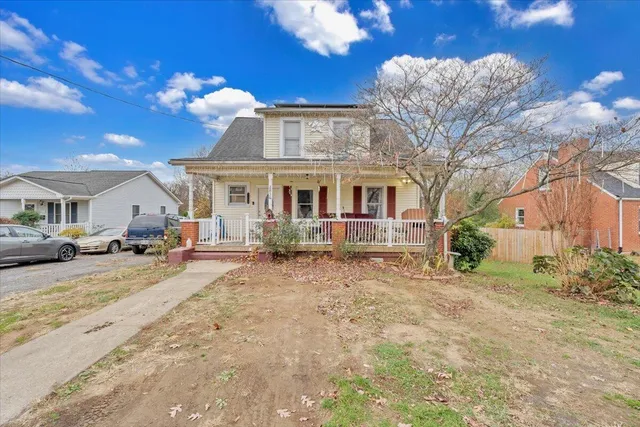 a view of a street with a building in the background