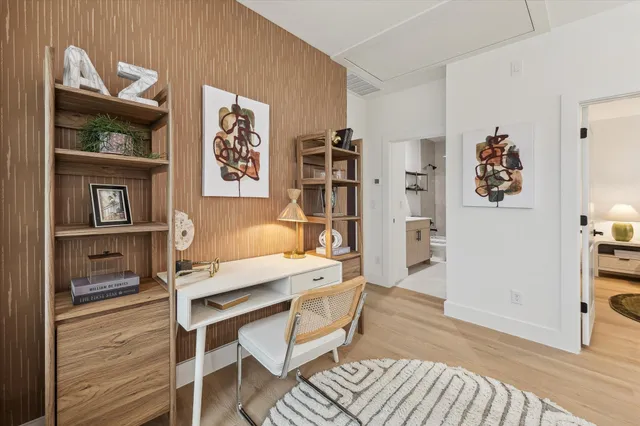 a bedroom with bed and window