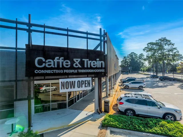 a view of a park with swings and slides