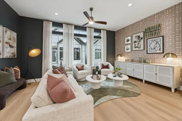 a living room with furniture and window