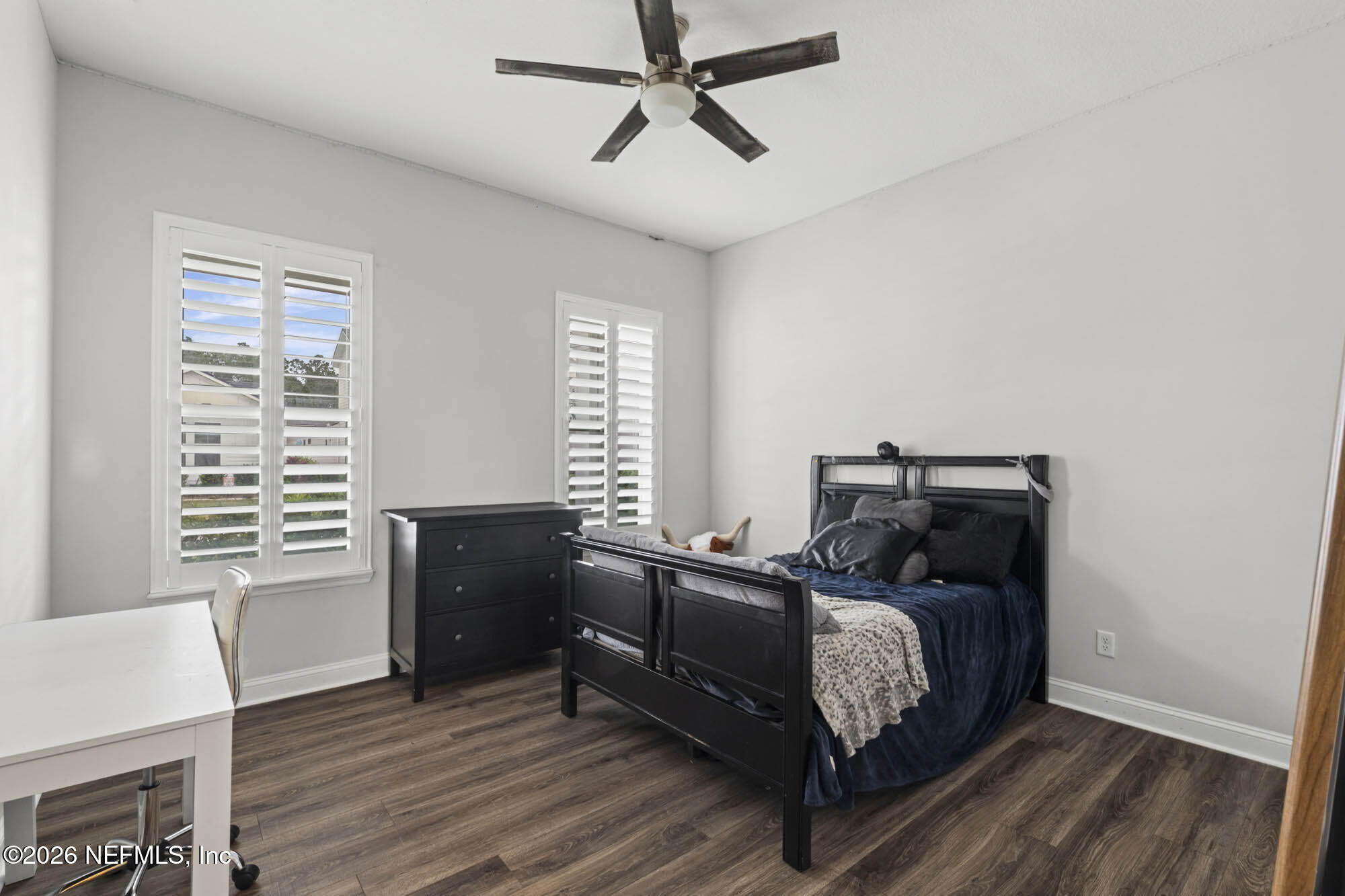 87 Footbridge Road St. Johns, FL 32259 - Photo 16 of 32 a bed room with a bed and a window