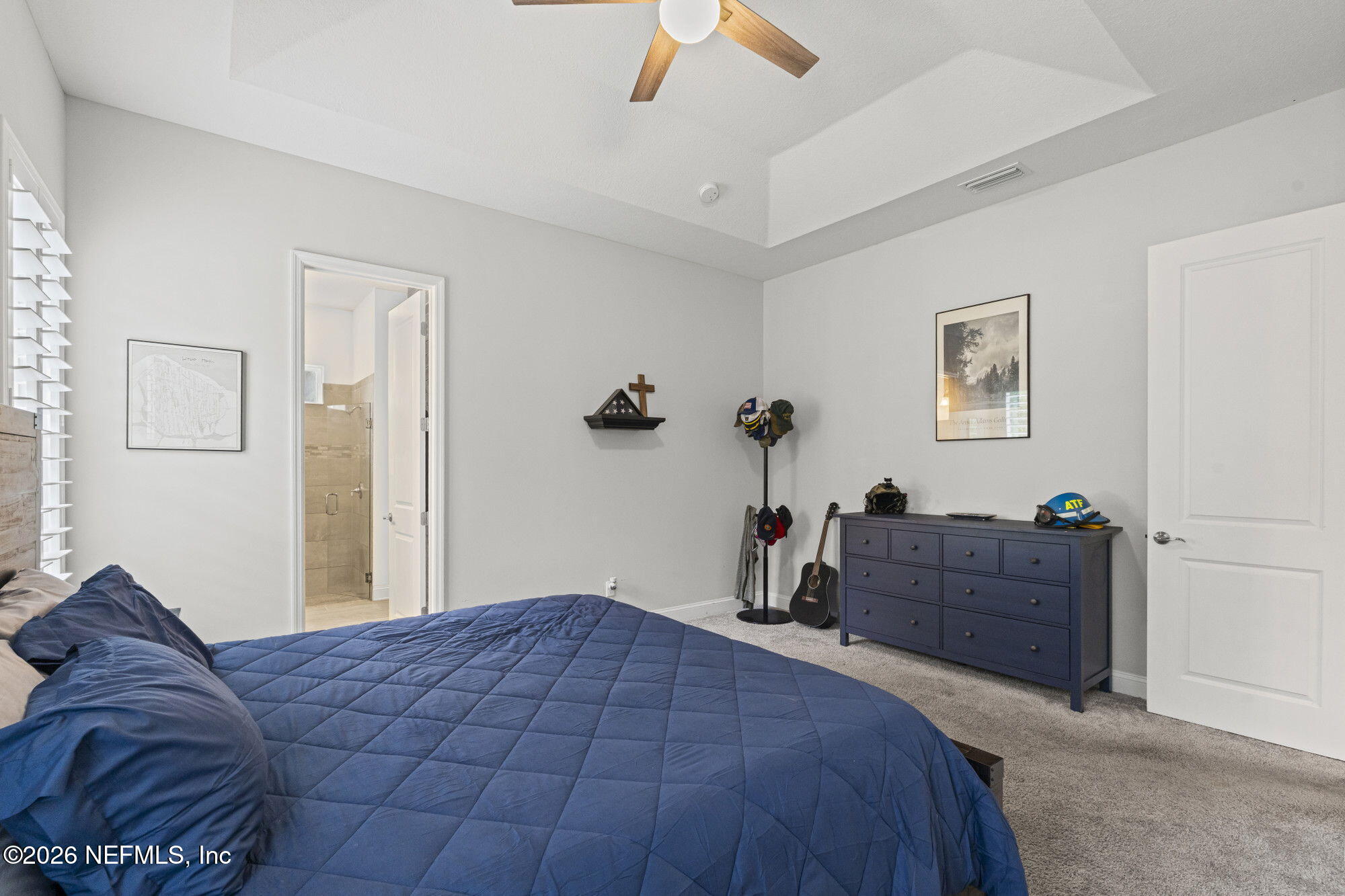 87 Footbridge Road St. Johns, FL 32259 - Photo 18 of 32 a bedroom with a bed and wooden floor