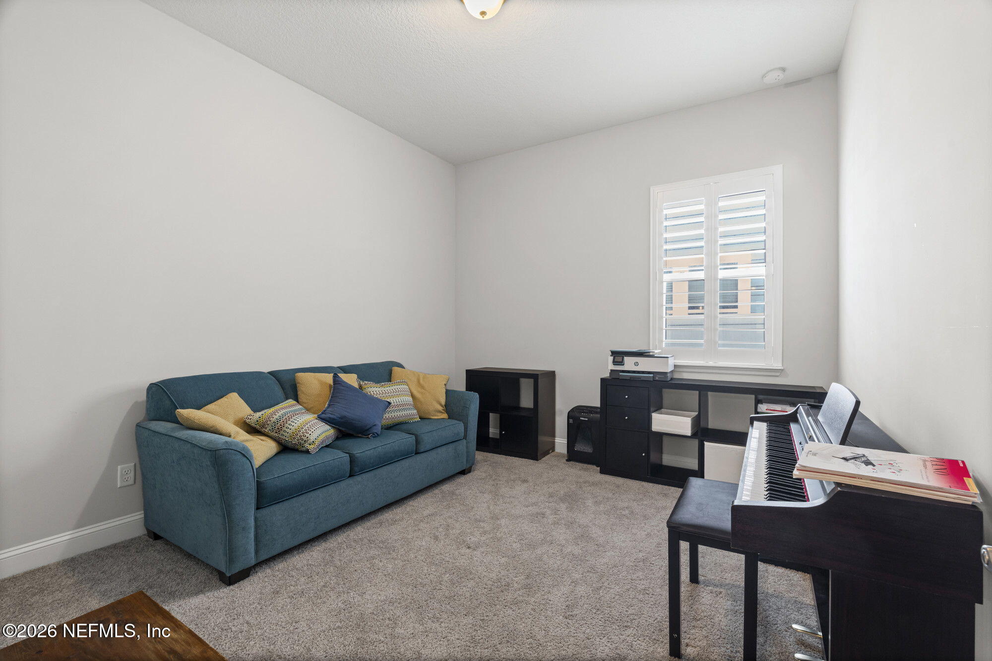 87 Footbridge Road St. Johns, FL 32259 - Photo 19 of 32 a living room with furniture and a window
