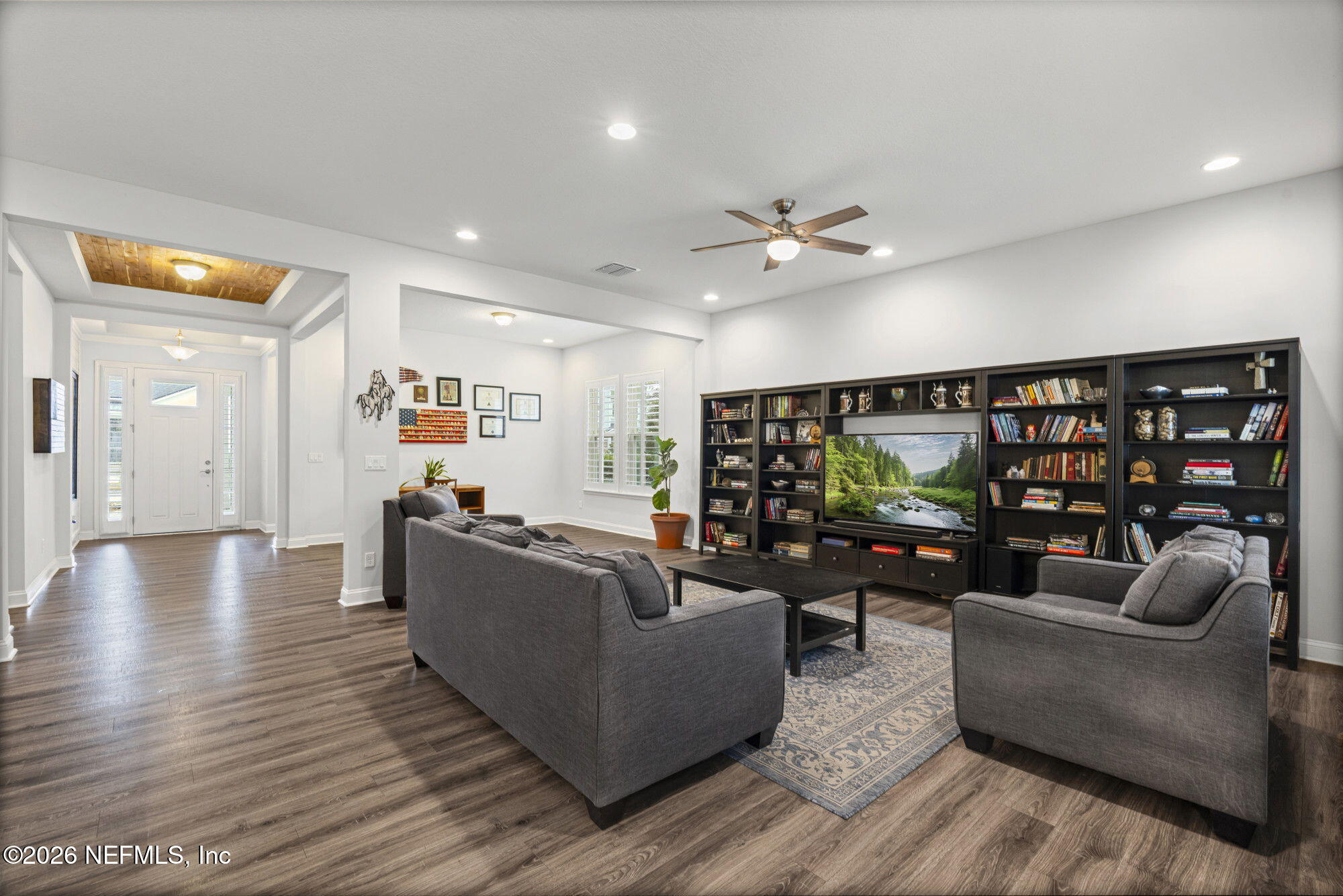 87 Footbridge Road St. Johns, FL 32259 - Photo 4 of 32 a living room with furniture and a flat screen tv