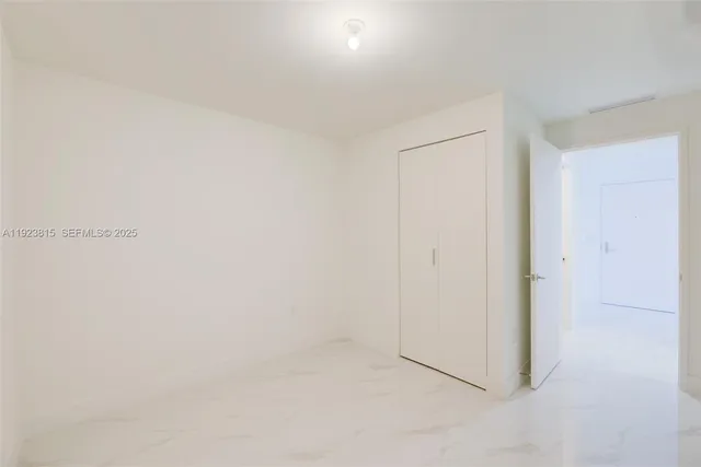 a bathroom with a sink and vanity
