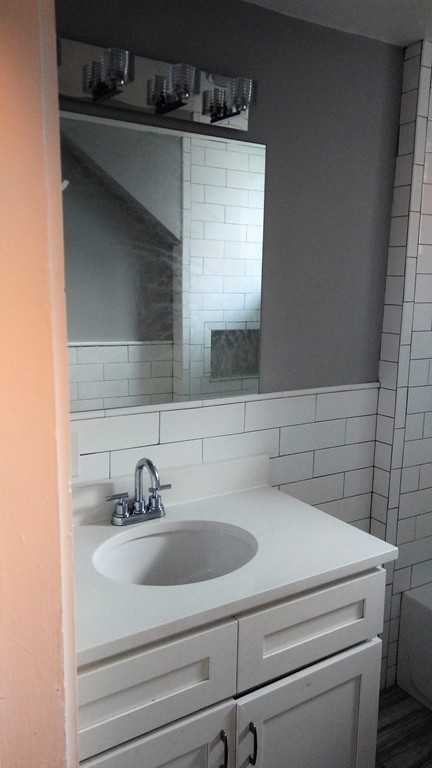 5 Mountfair Terrace Boston, MA 02136 - Photo 7 of 15 a bathroom with a sink and a mirror