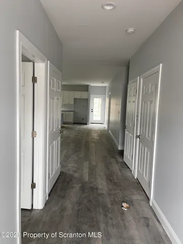 a view of entryway with livingroom