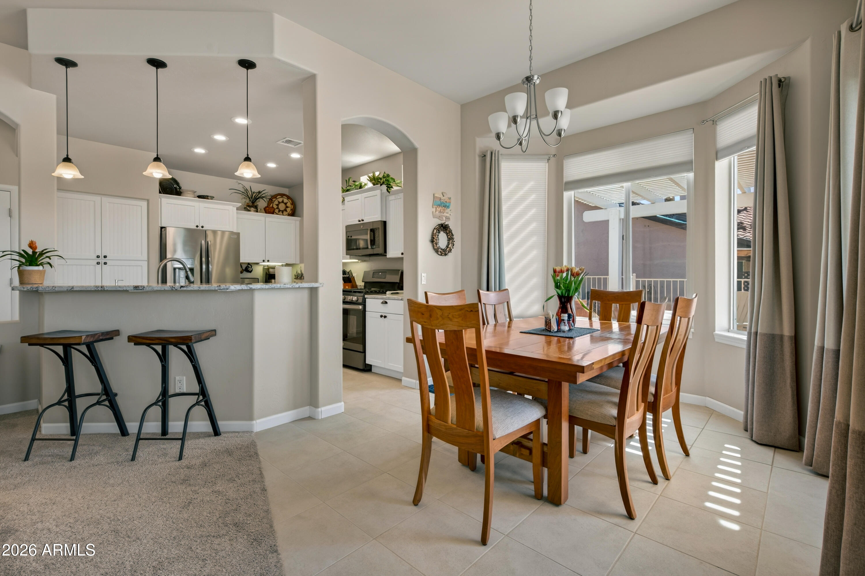 718 South Wandering River Road Cornville, AZ 86325 - Photo 10 of 41 a dining room with furniture and window