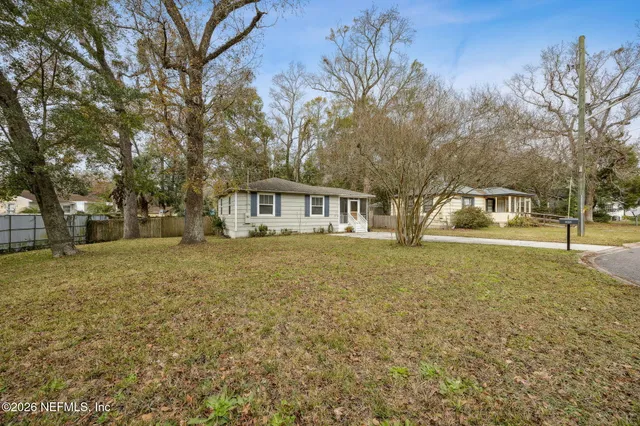 a house with trees in front of it