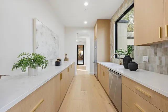 a view of a room with large windows