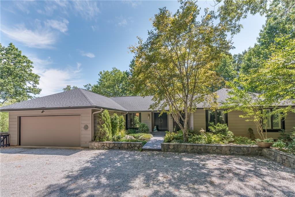 320 Ridgetop Road Tryon, NC 28782 - Photo 1 of 36 a view of a house with a yard and large tree