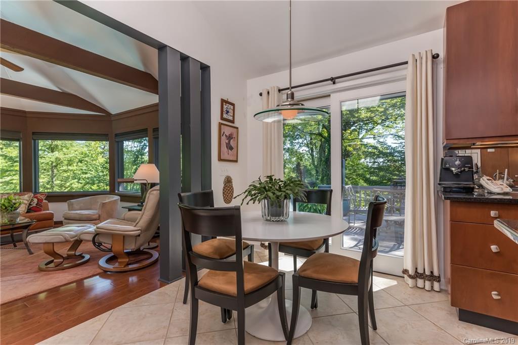 320 Ridgetop Road Tryon, NC 28782 - Photo 14 of 36 a dining room with furniture and a window