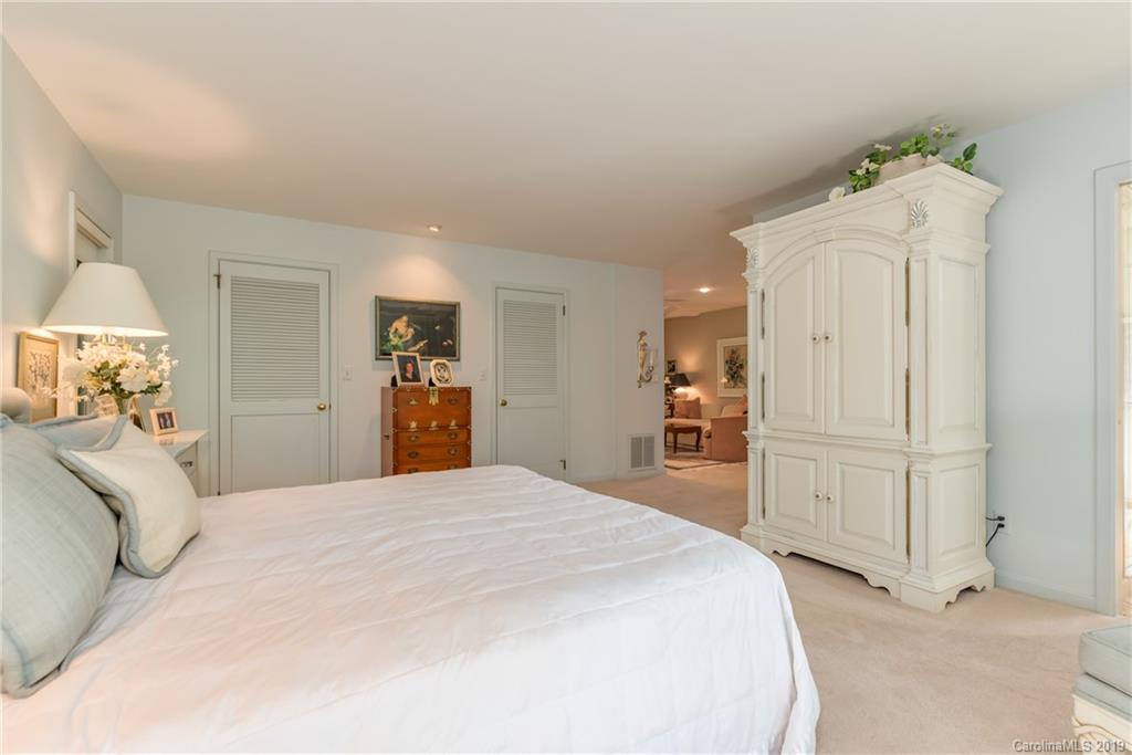 320 Ridgetop Road Tryon, NC 28782 - Photo 23 of 36 a large white bed in a white room