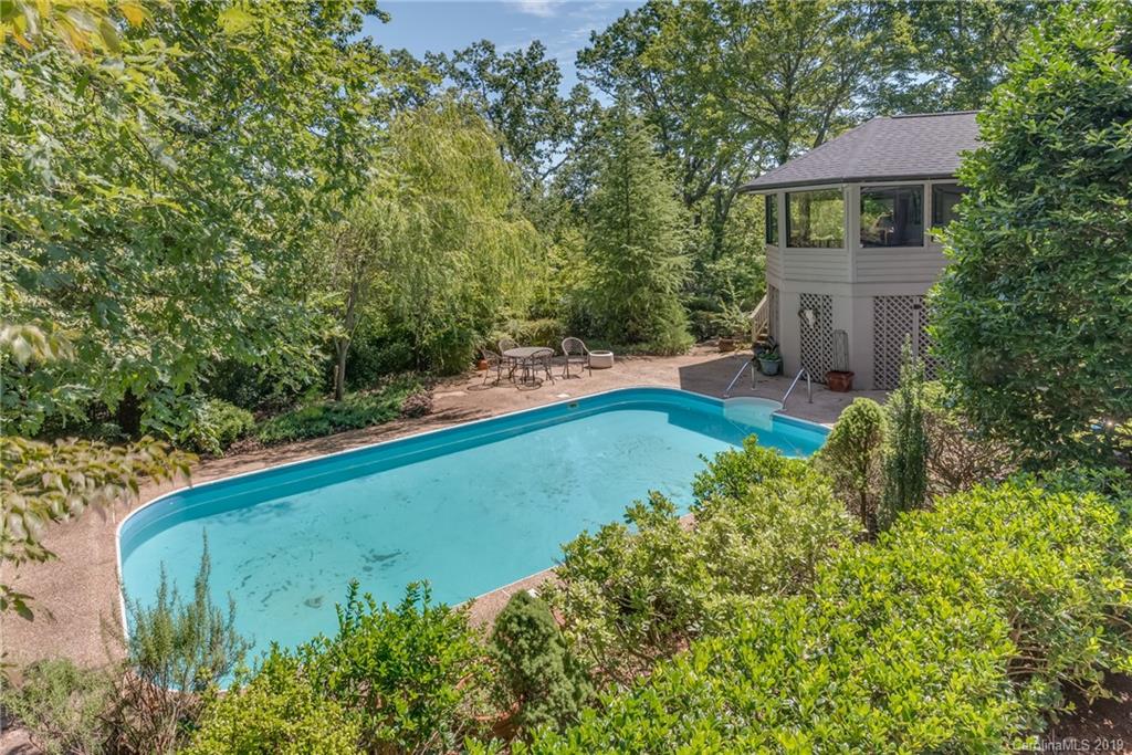320 Ridgetop Road Tryon, NC 28782 - Photo 31 of 36 a view of a house with a yard and sitting area