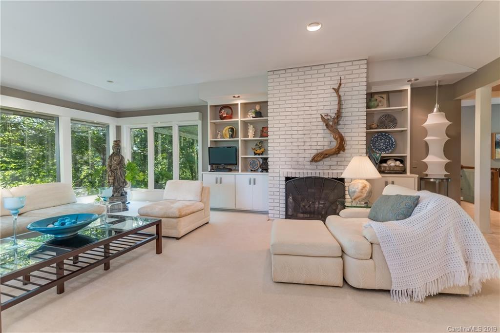 320 Ridgetop Road Tryon, NC 28782 - Photo 6 of 36 a living room with furniture and large windows