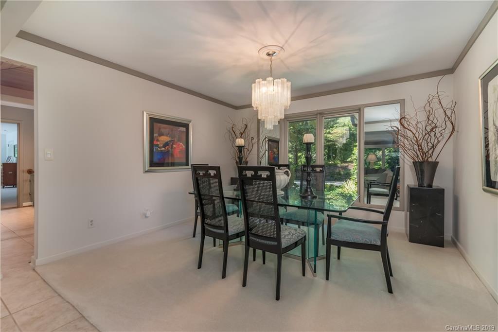320 Ridgetop Road Tryon, NC 28782 - Photo 9 of 36 a view of a dining room with furniture window and outside view