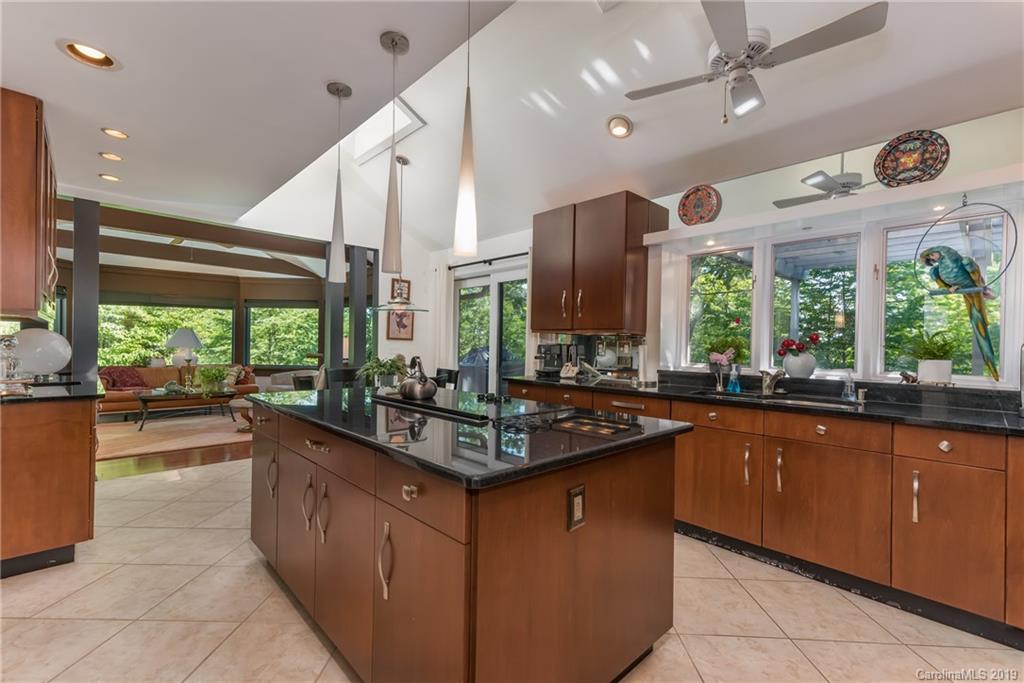 320 Ridgetop Road Tryon, NC 28782 - Photo 10 of 36 a kitchen with lots of counter space and a sink