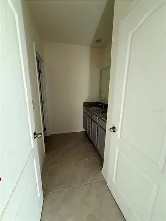 a view of a house with backyard and garden