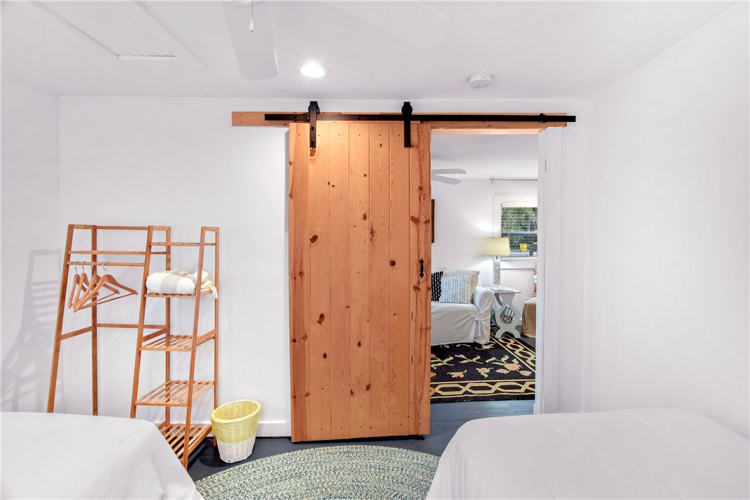 211 Trumbull Street Darien, GA 31305 - Photo 10 of 26 Barn doors save room and add a modern touch