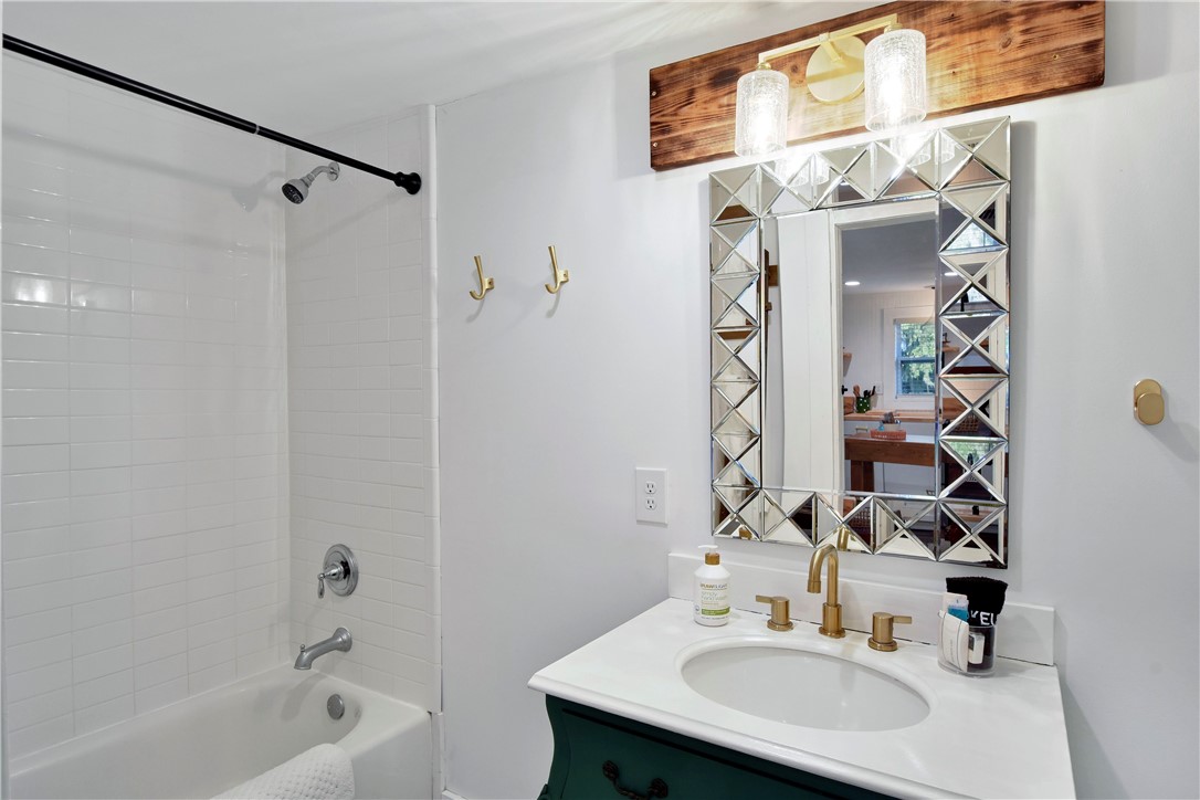 211 Trumbull Street Darien, GA 31305 - Photo 18 of 26 A spacious bathroom serves the house well.