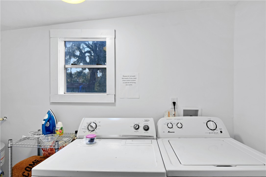 211 Trumbull Street Darien, GA 31305 - Photo 21 of 26 Laundry room is enclosed off the screened porch.