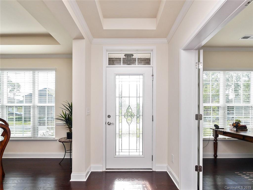 7817 Pope Farm Road Charlotte, NC 28269 - Photo 2 of 26 a view of a room with wooden floor and a window