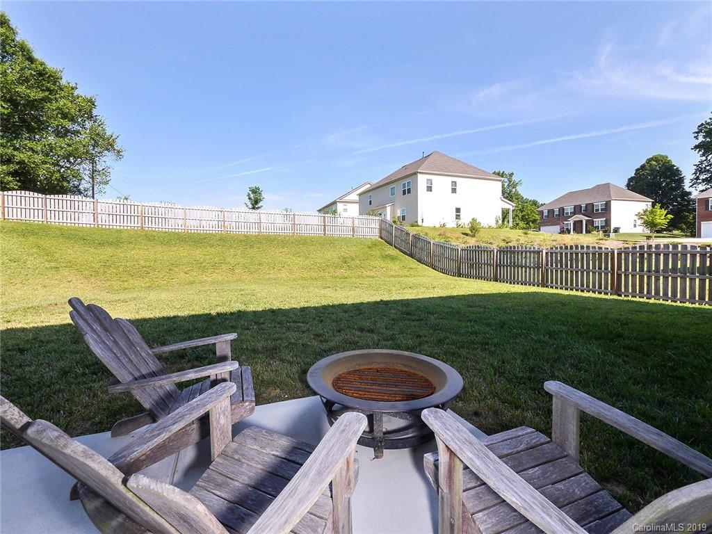 7817 Pope Farm Road Charlotte, NC 28269 - Photo 25 of 26 a view of a chairs and table in the terrace