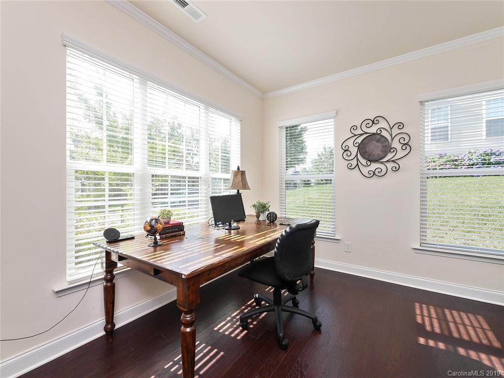 7817 Pope Farm Road Charlotte, NC 28269 - Photo 4 of 26 a view of a workspace with a window