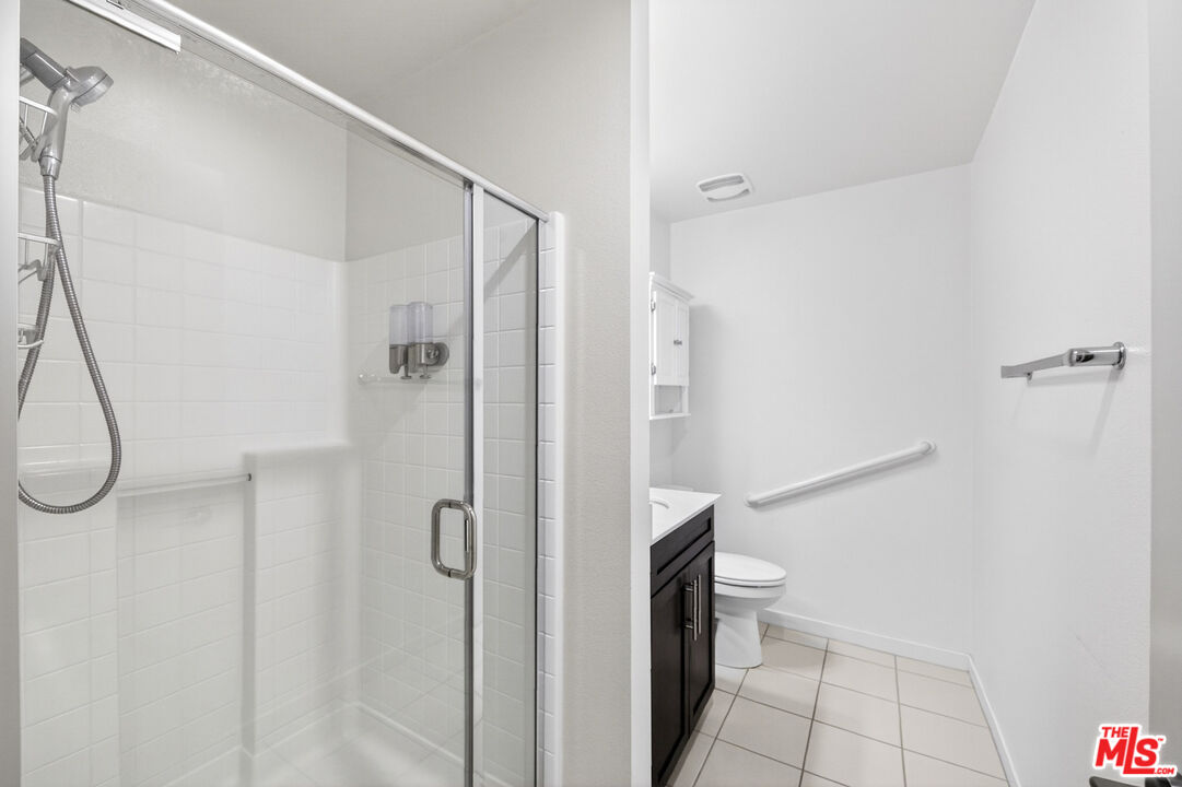 676 Colorado Circle Carson, CA 90745 - Photo 4 of 36 a bathroom with a shower and a toilet