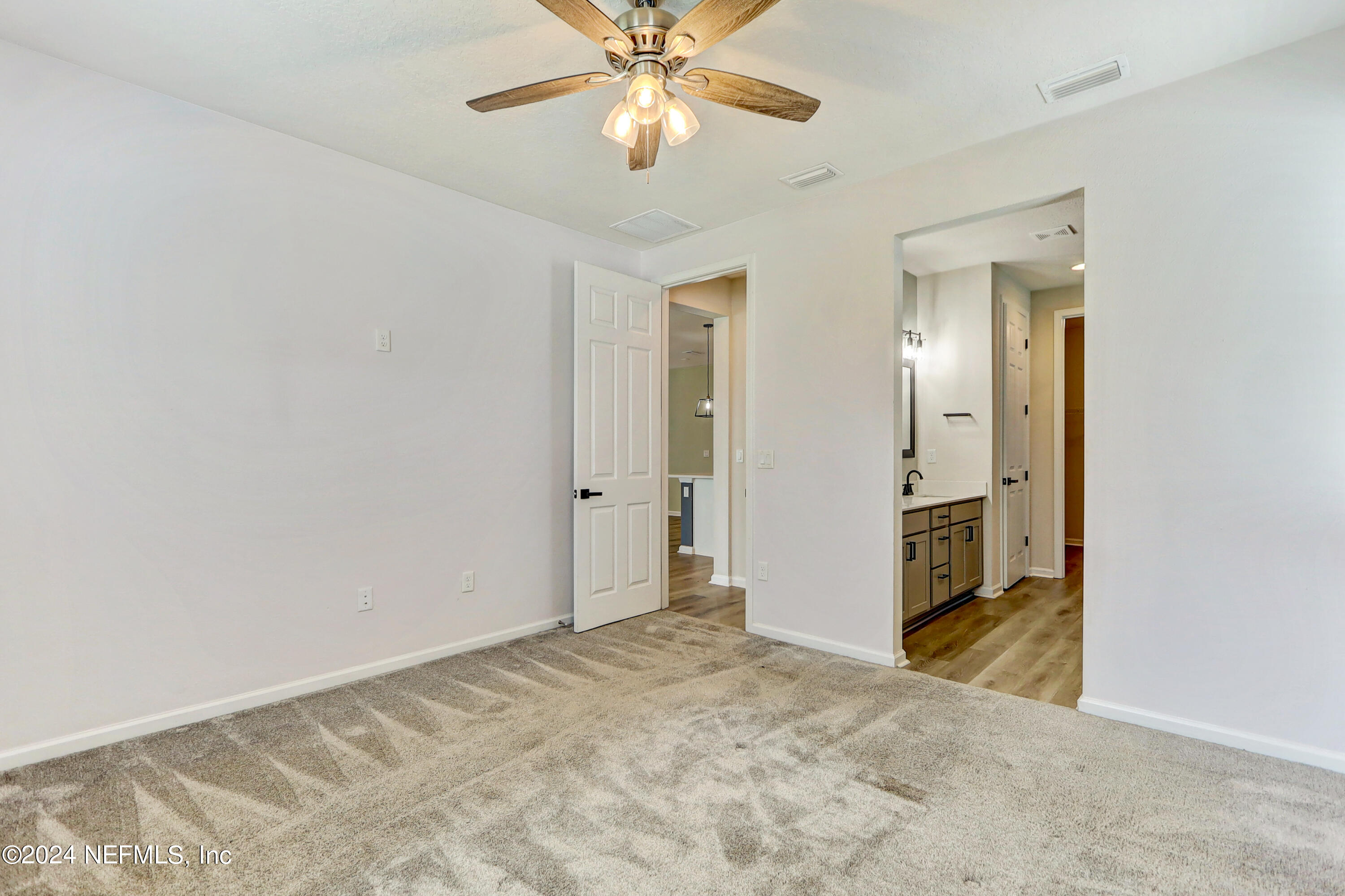 1880 Cogdill Trace Middleburg, FL 32068 - Photo 24 of 40 a view of a livingroom with a chandelier fan