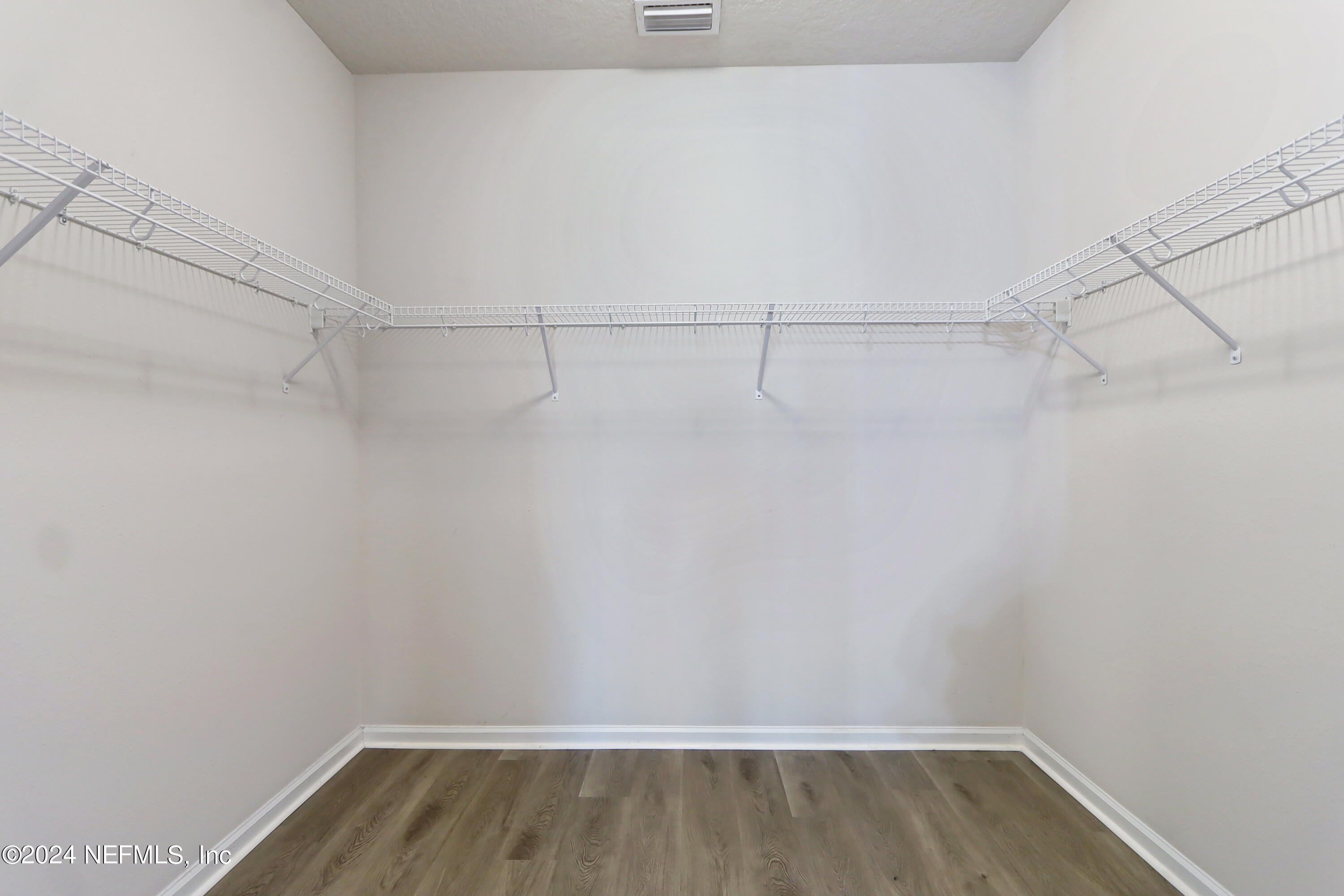 1880 Cogdill Trace Middleburg, FL 32068 - Photo 28 of 40 a view of a room with racks on the wall