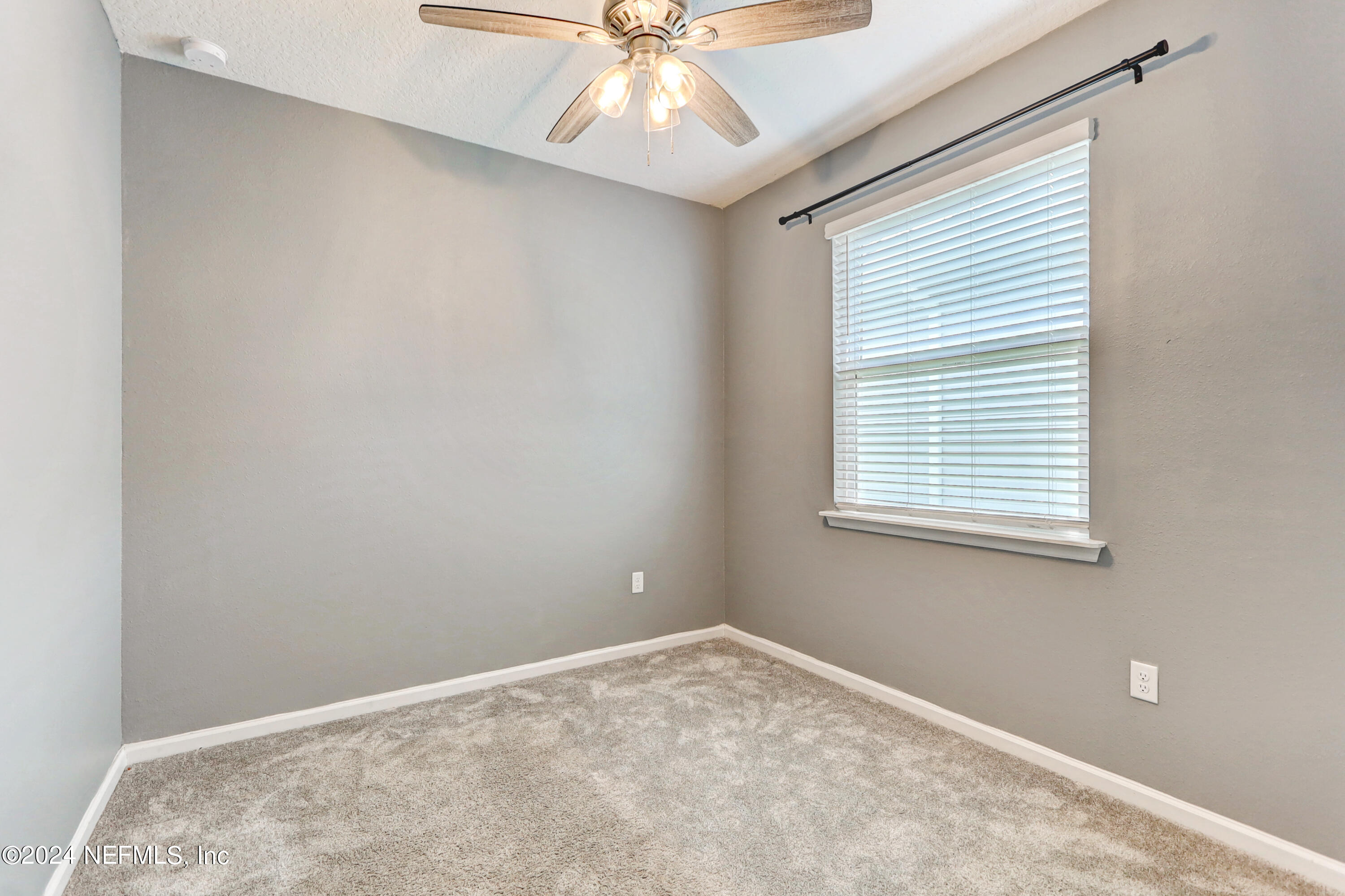 1880 Cogdill Trace Middleburg, FL 32068 - Photo 33 of 40 a view of an empty room with a window