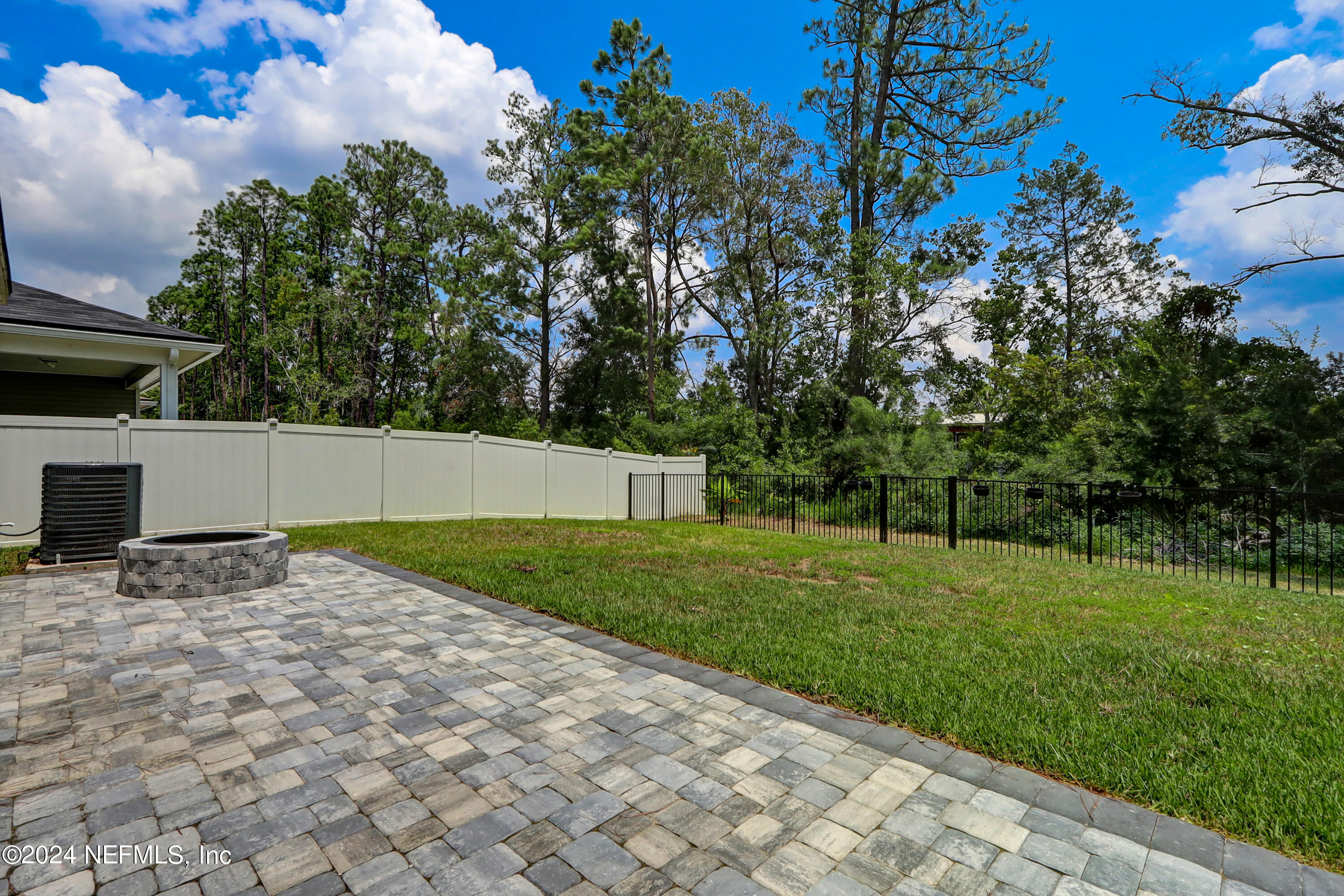 1880 Cogdill Trace Middleburg, FL 32068 - Photo 39 of 40 a backyard of a house with lots of green space